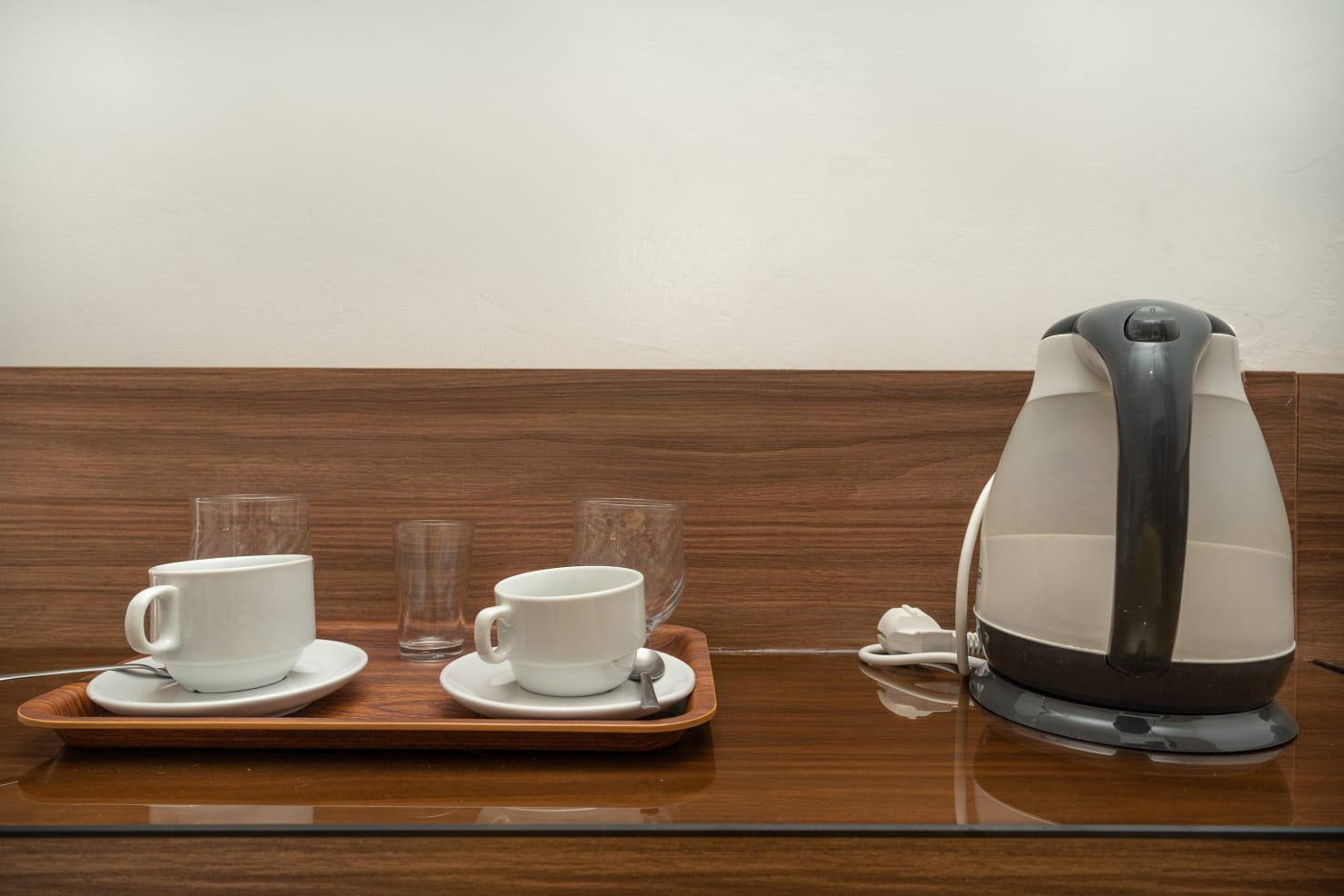 Tea and coffee tray with kettle in a guest room
