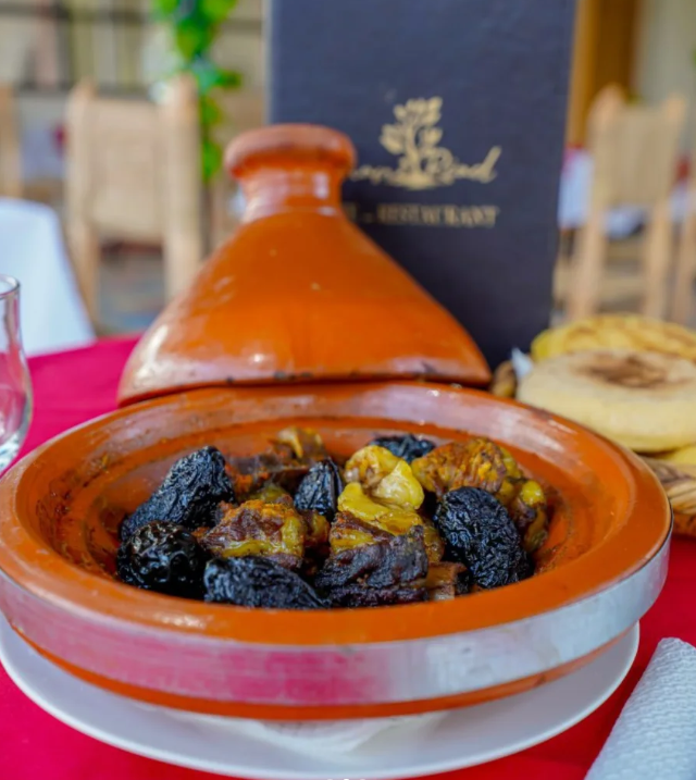 Traditional Moroccan tagine served at the Jnane Riad restaurant