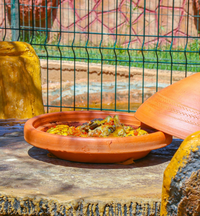 Moroccan tagine served in the gardens at Jnane Riad