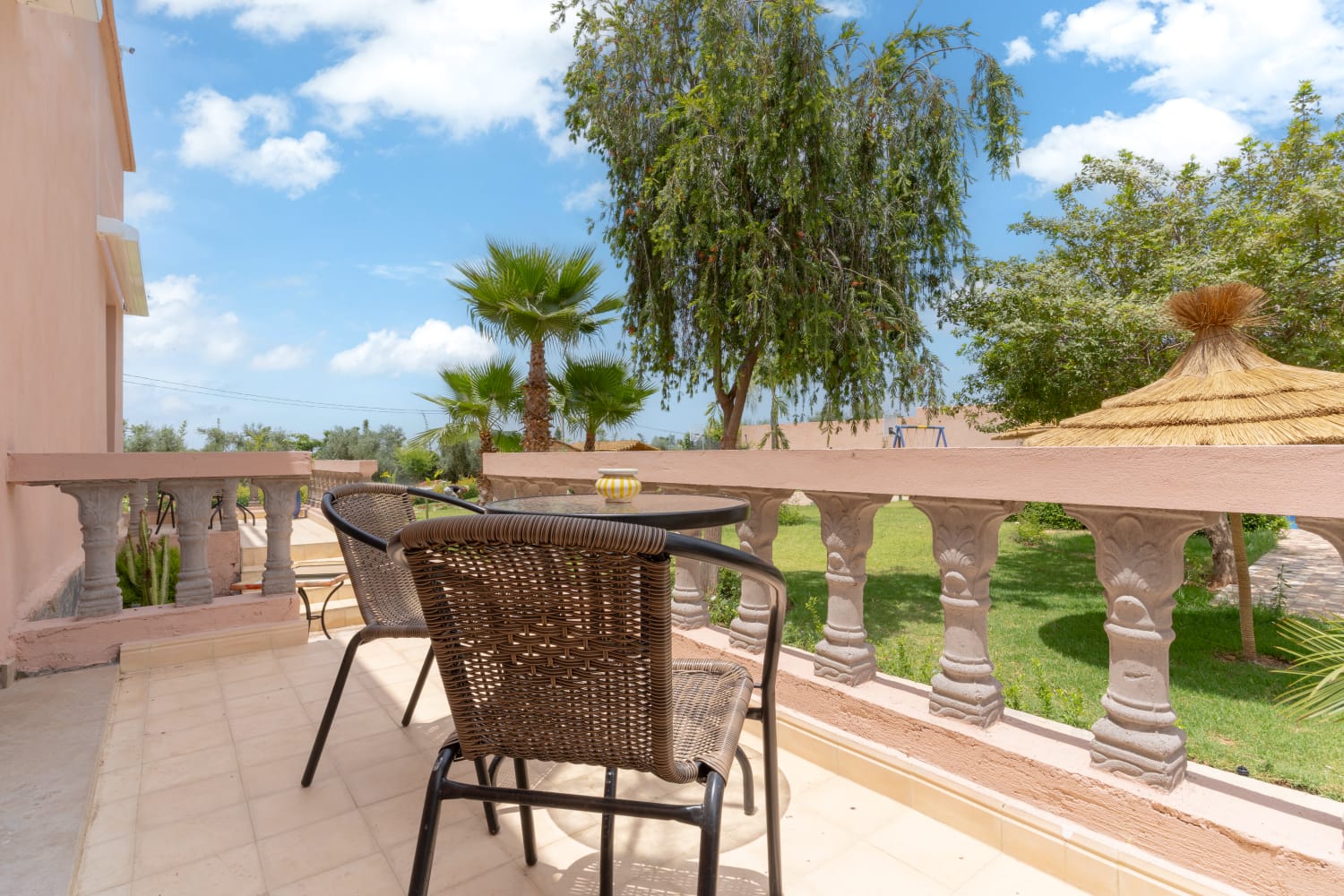 Pool terrace with mountain views at Jnane Riad