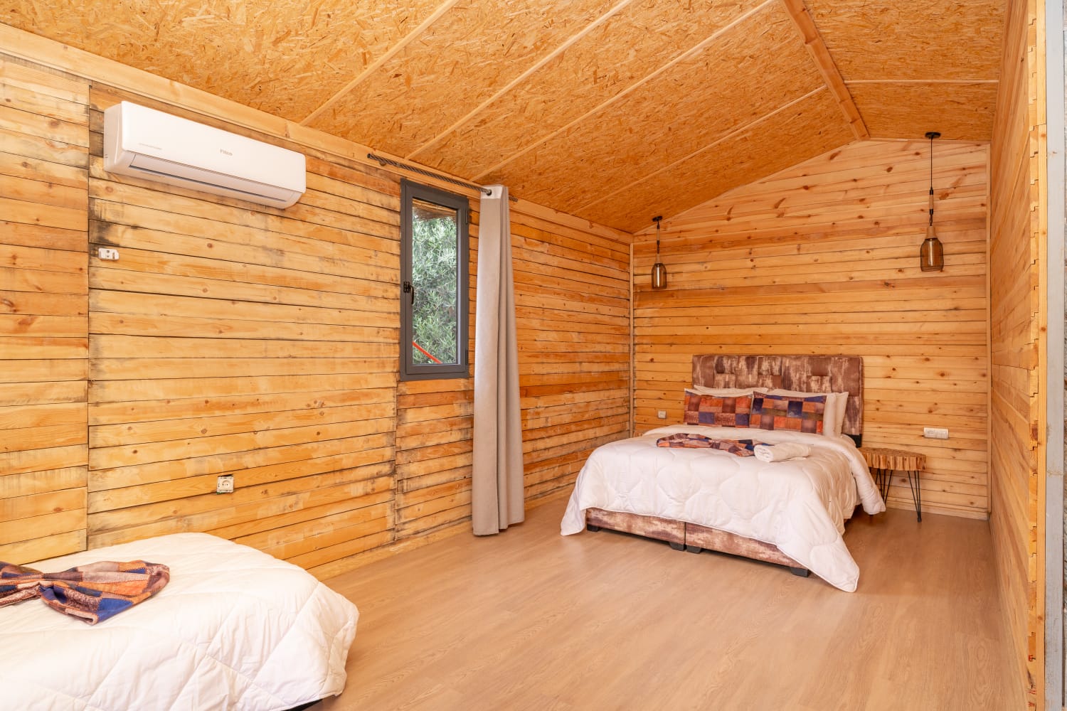 Bedroom with twin beds inside Villa Ouarzazate