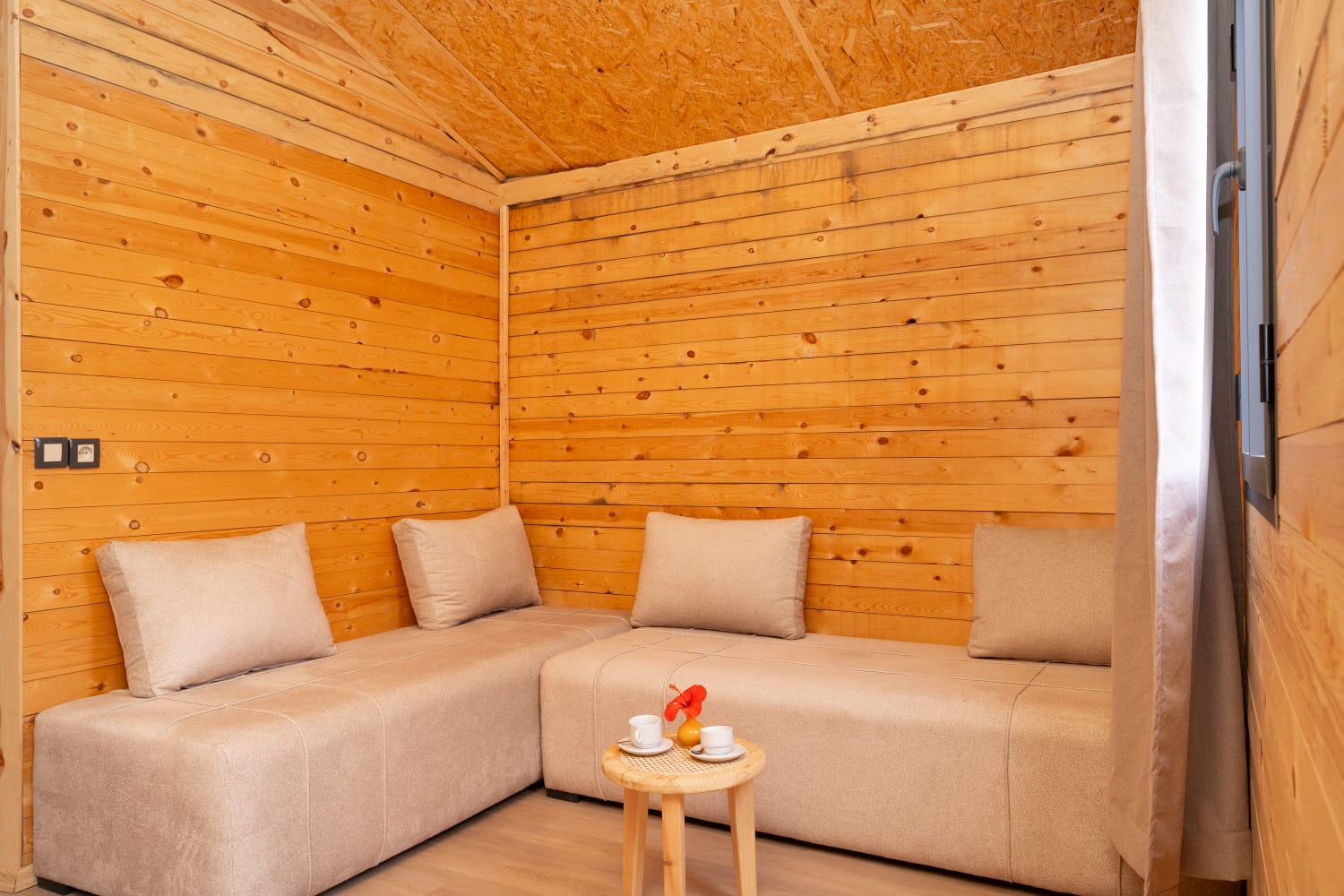 Comfortable lounge seating in the wooden Villa Ouarzazate